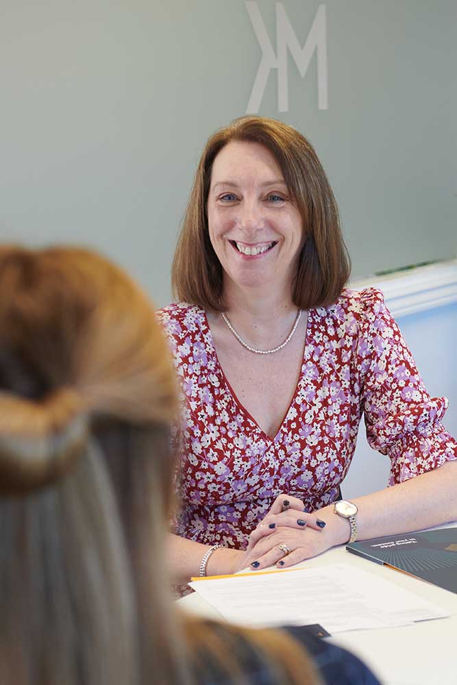 Cheryl Voller sitting in a meeting at MacKenzie King